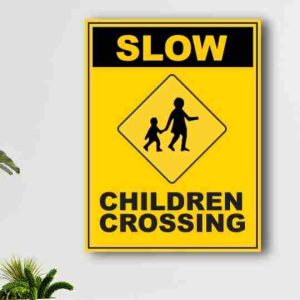Slow children crossing signage